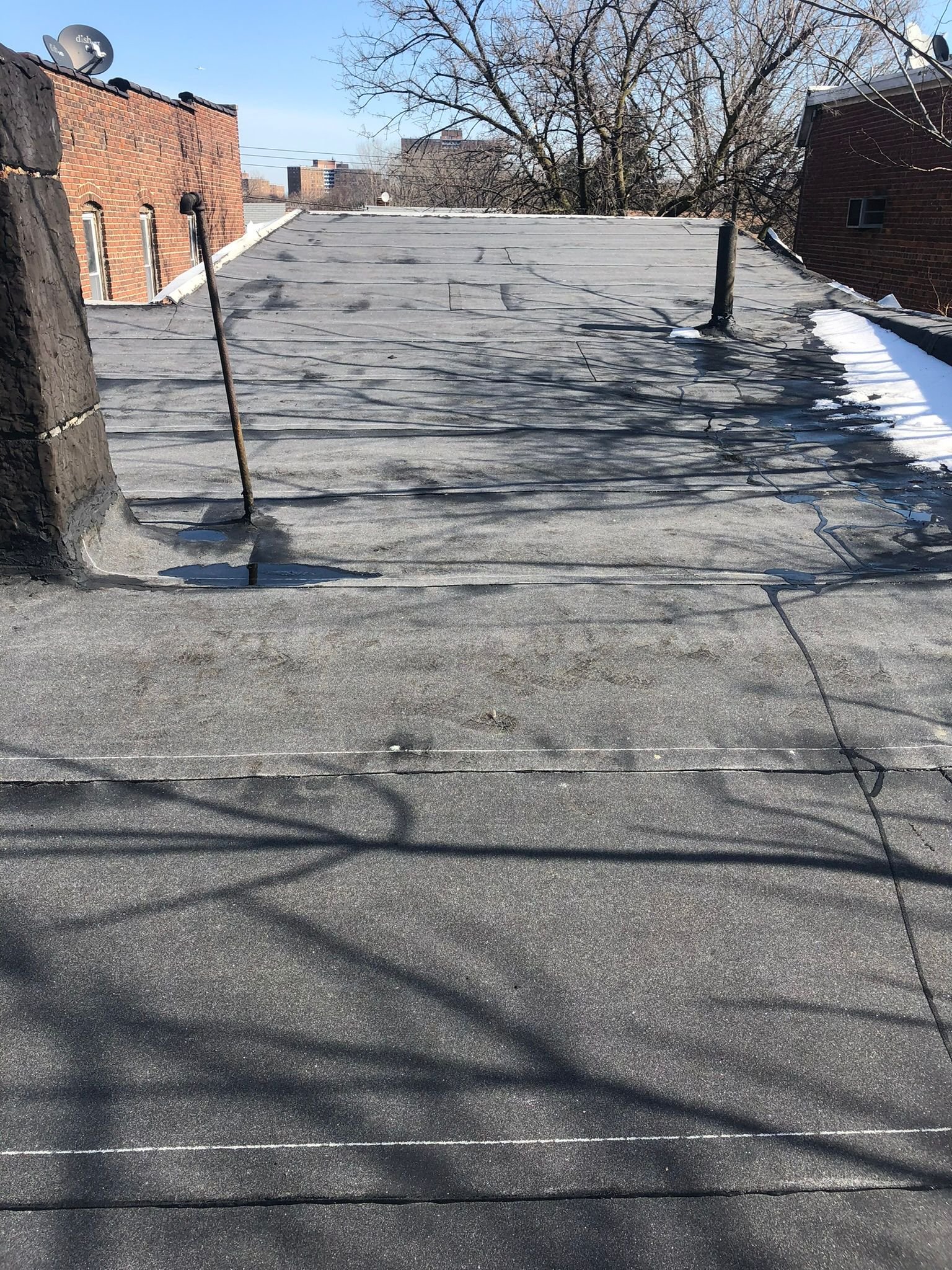 Flat roof installation and replacement service in New York City